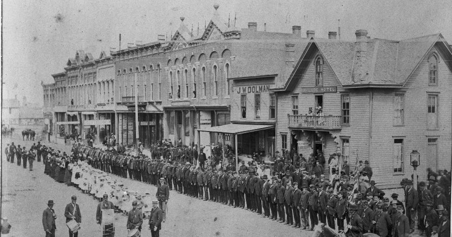 The Star Blocks turns 140 years old tomorrow! The first businesses opened in the building circa May 1, 1883.
This is the earliest known photo of it, for the Decoration Day parade on July 3, 1884. (It's the building with three triangular gables on top at the left.) Here's hoping we get another 140 years out of it after the rehab is done!