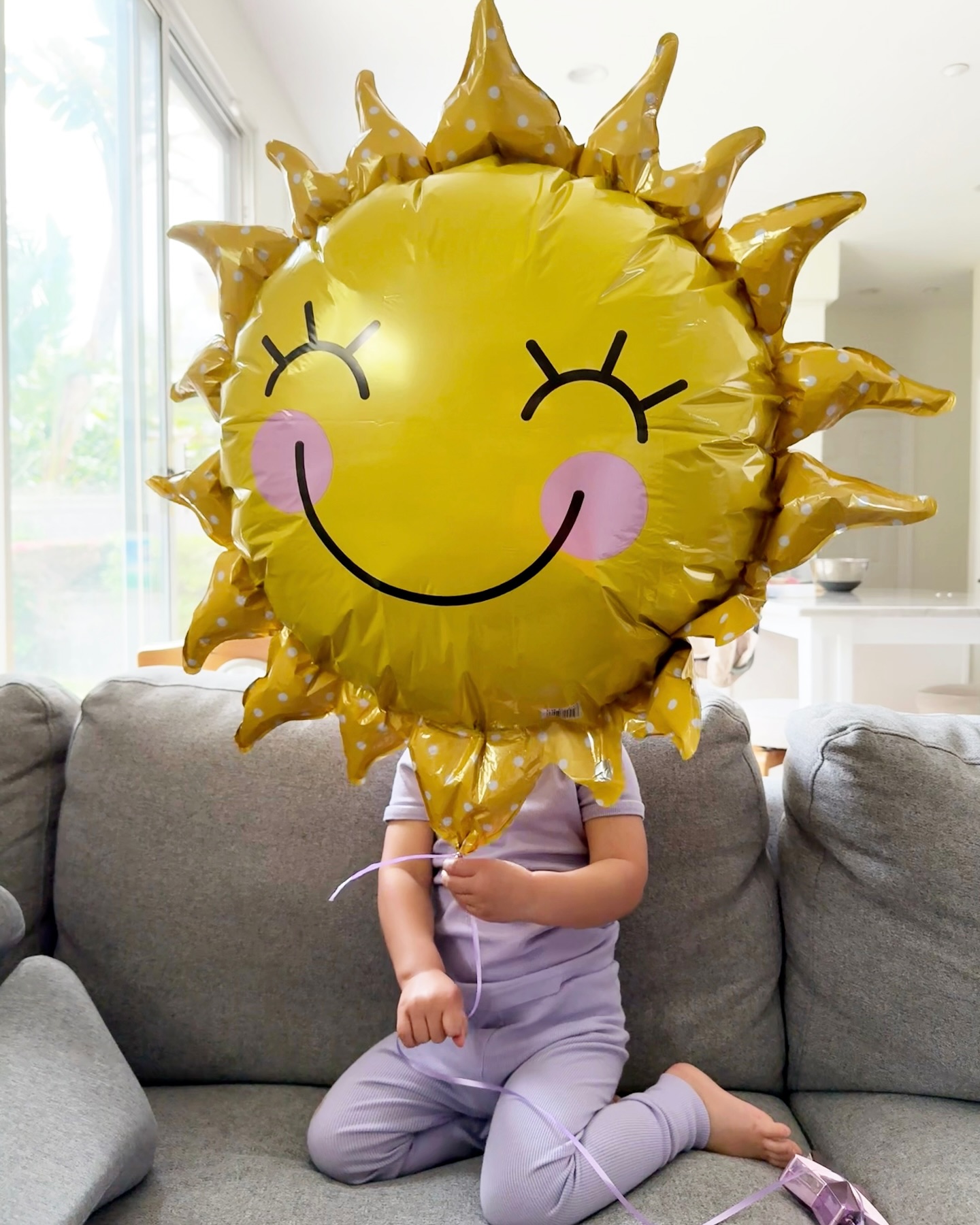 One week later and this birthday girl is still soaking up the sunshine with her favorite balloon!☀️