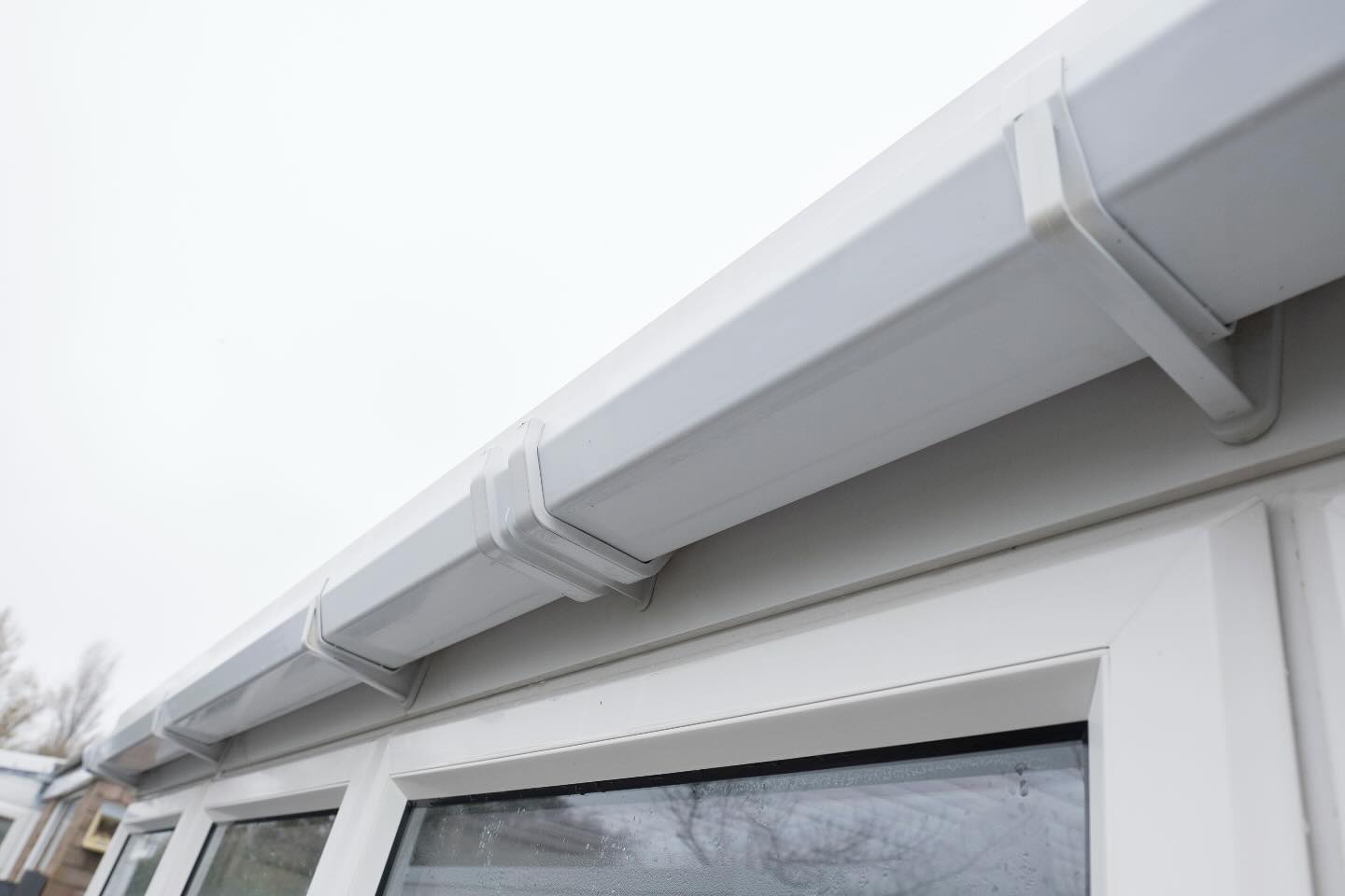 Gutters, soffit, and fascia sparkling clean! Back to brand new!